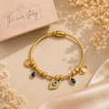 Gold Charm and Evil Eye Bracelet